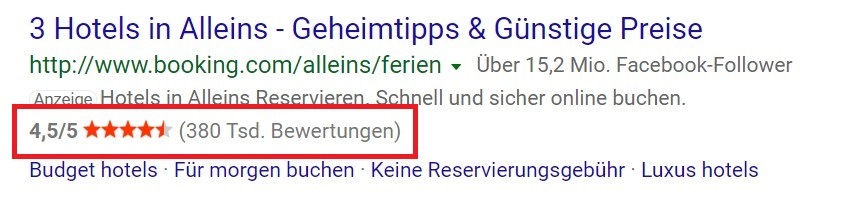 Screenshot eines Bing Suchergebnisses von Check24.de. Die Rezensionserweiterung ist rot markiert.